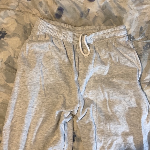 Light grey aero joggers w/ pink lettering down one leg - Picture 2 of 3